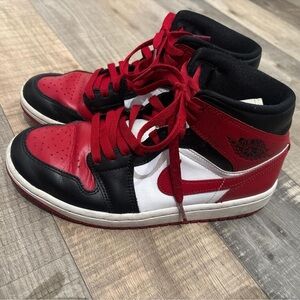 Red and Black Air Jordan 1 Mid Alternate bred toe